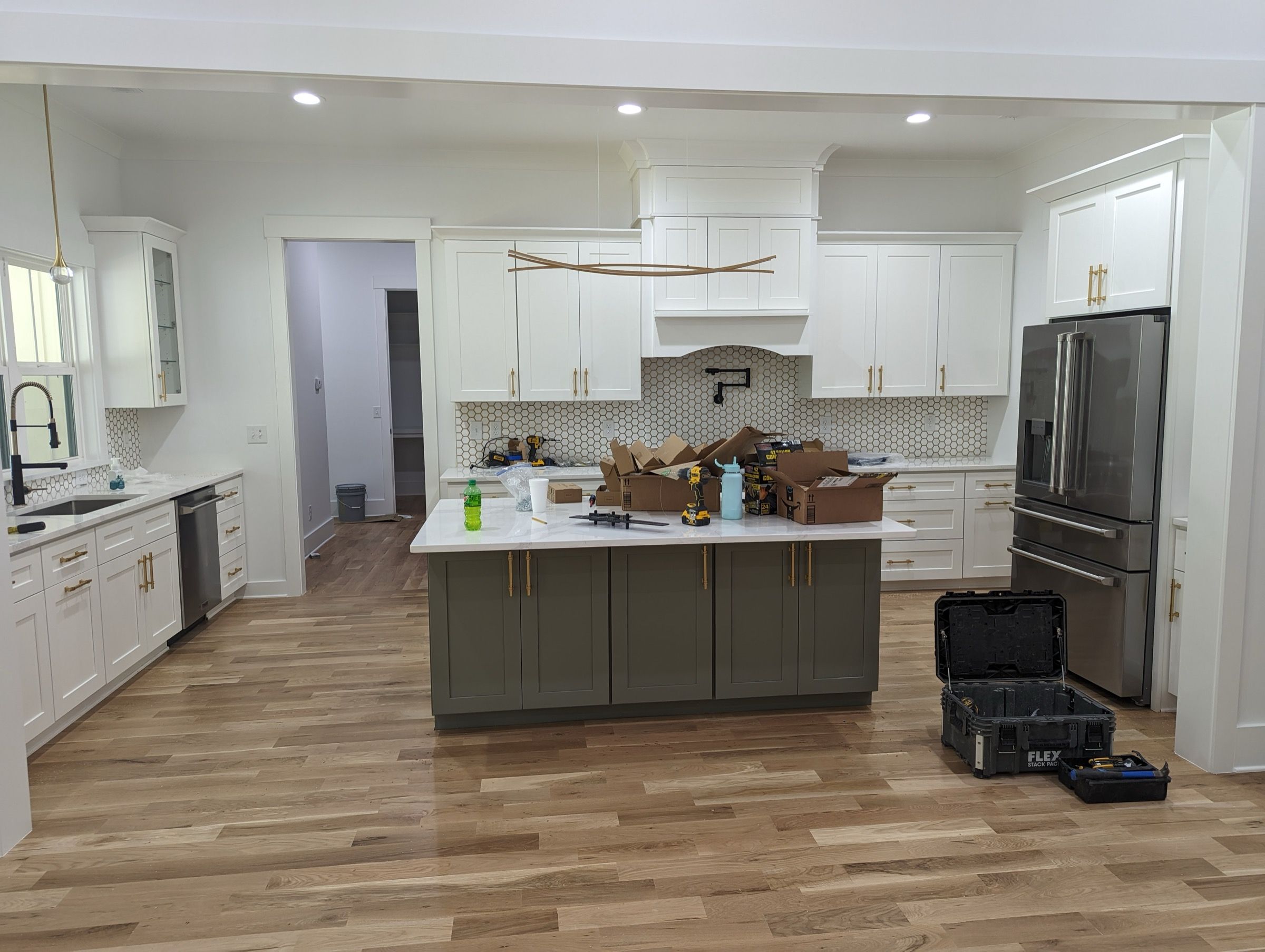 Cabinet Painting — two-tone cabinets, white perimeter and sage-green island in Cary, NC