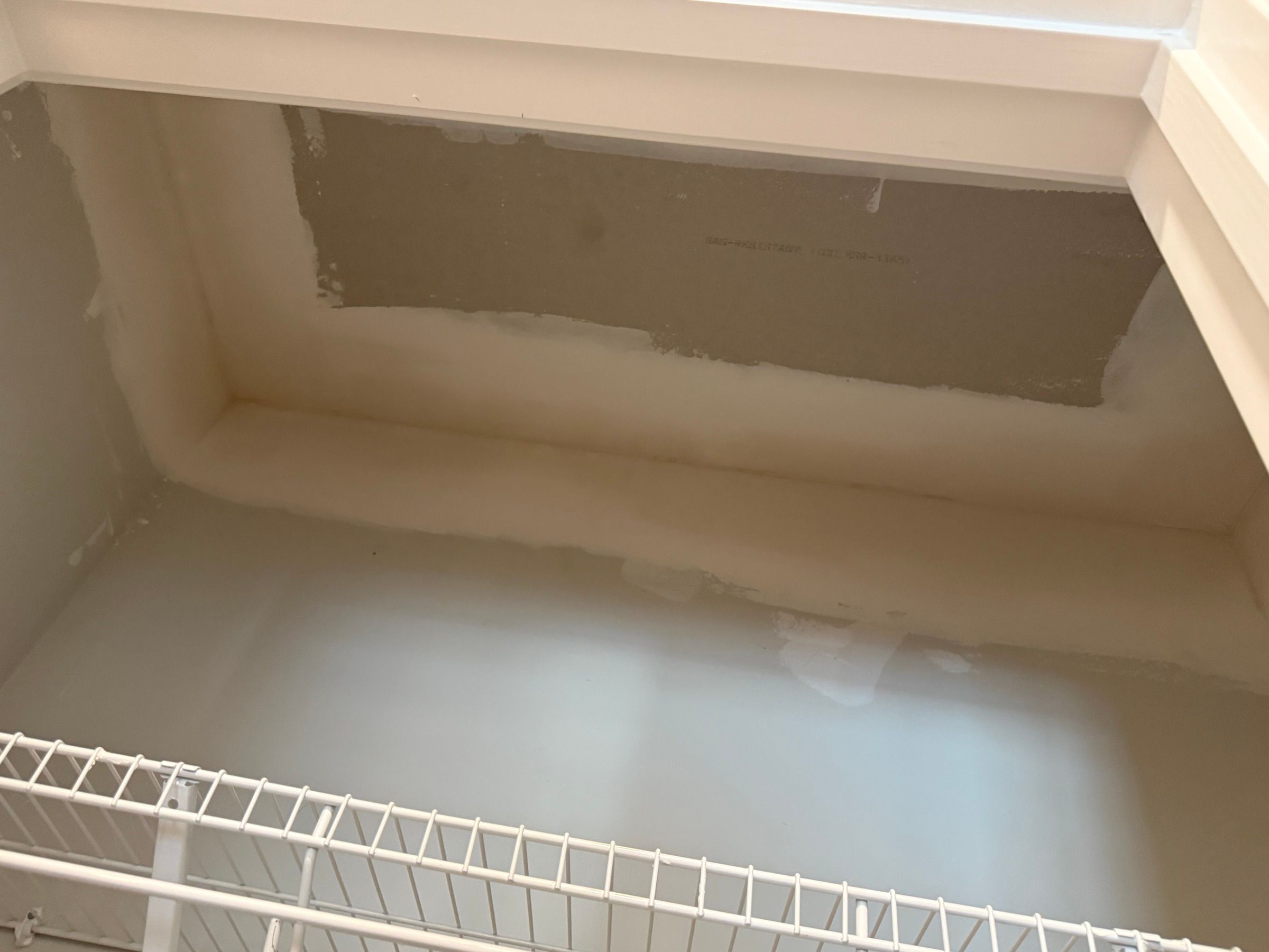 Drywall Repair — closet patch, fresh joint compound at seam in Chapel Hill, NC