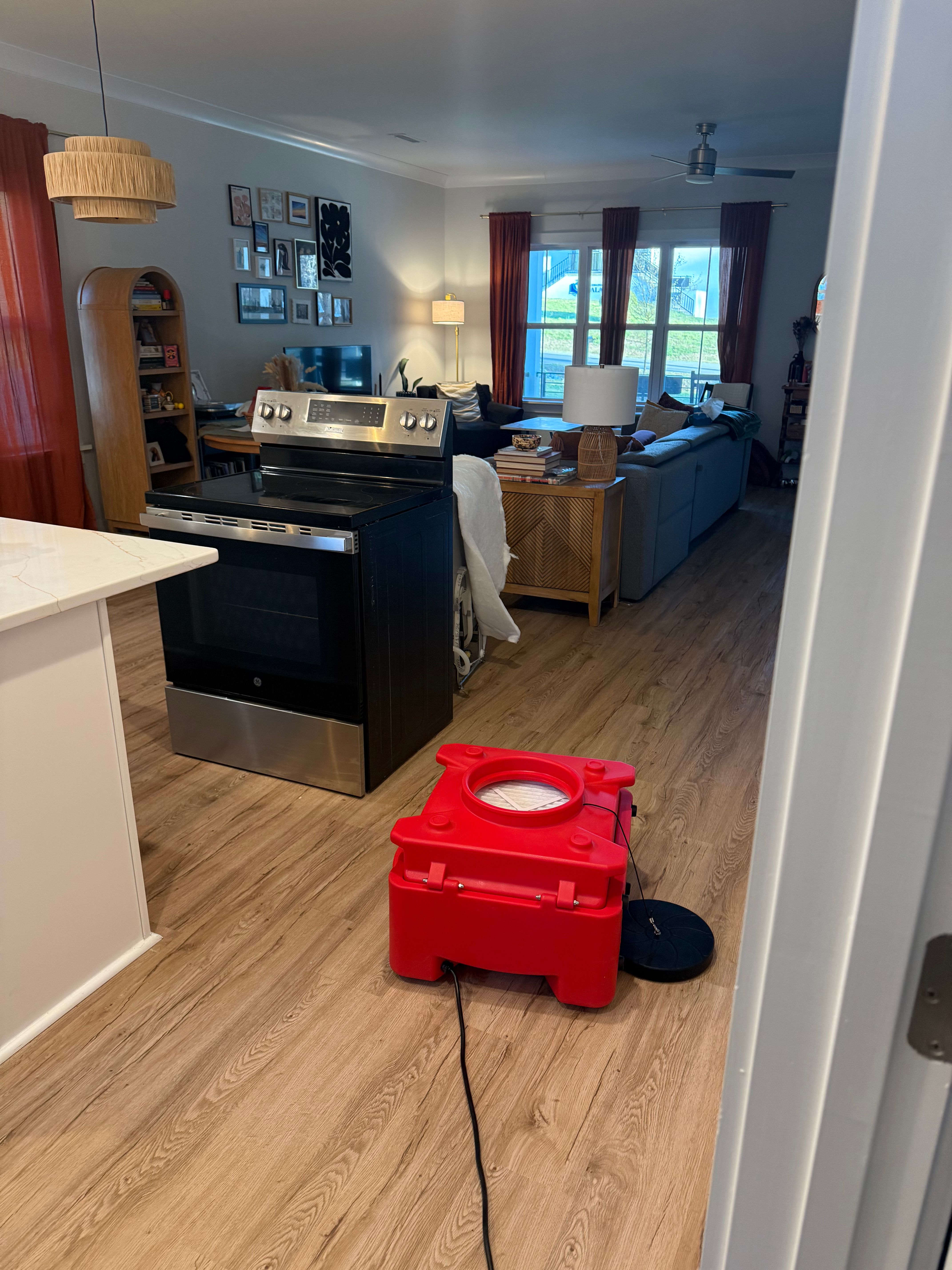 Interior Painting — open-plan repaint, light gray walls in Durham, NC