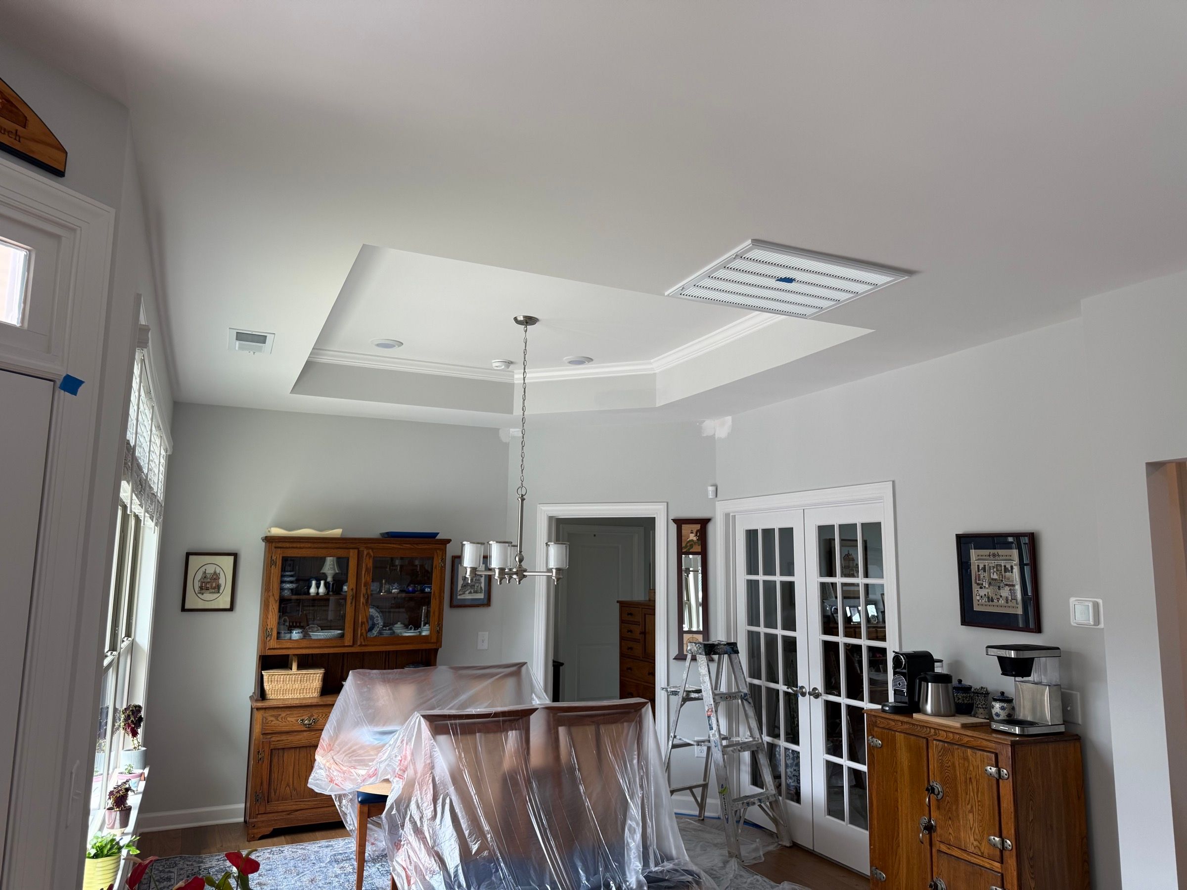 Interior Painting — dining room with warm gray walls in Chapel Hill, NC